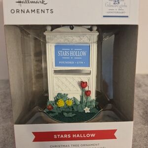 Hallmark Stars Hollow Ornament with Red and Yellow Accents
